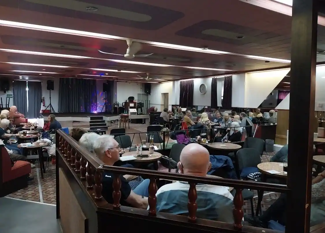 A busy community event in the main hall