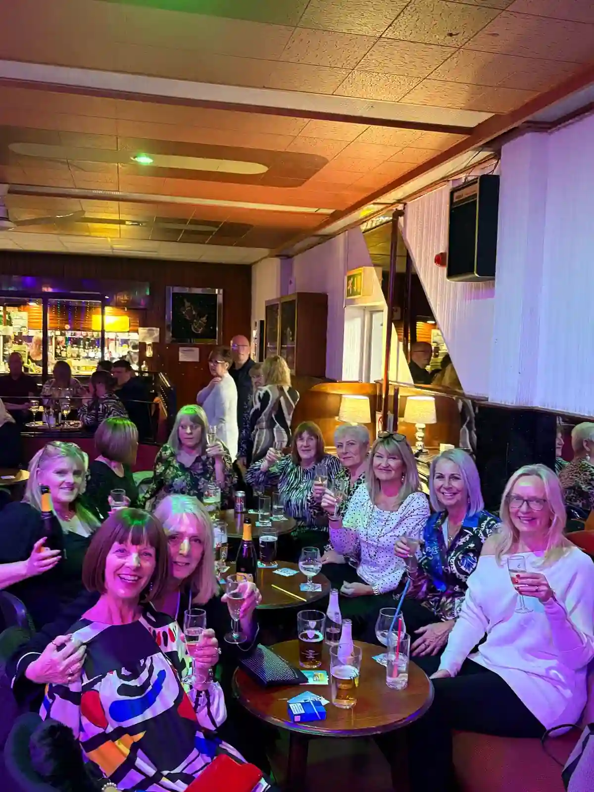 A group of women celebrating a girls night out at the club
